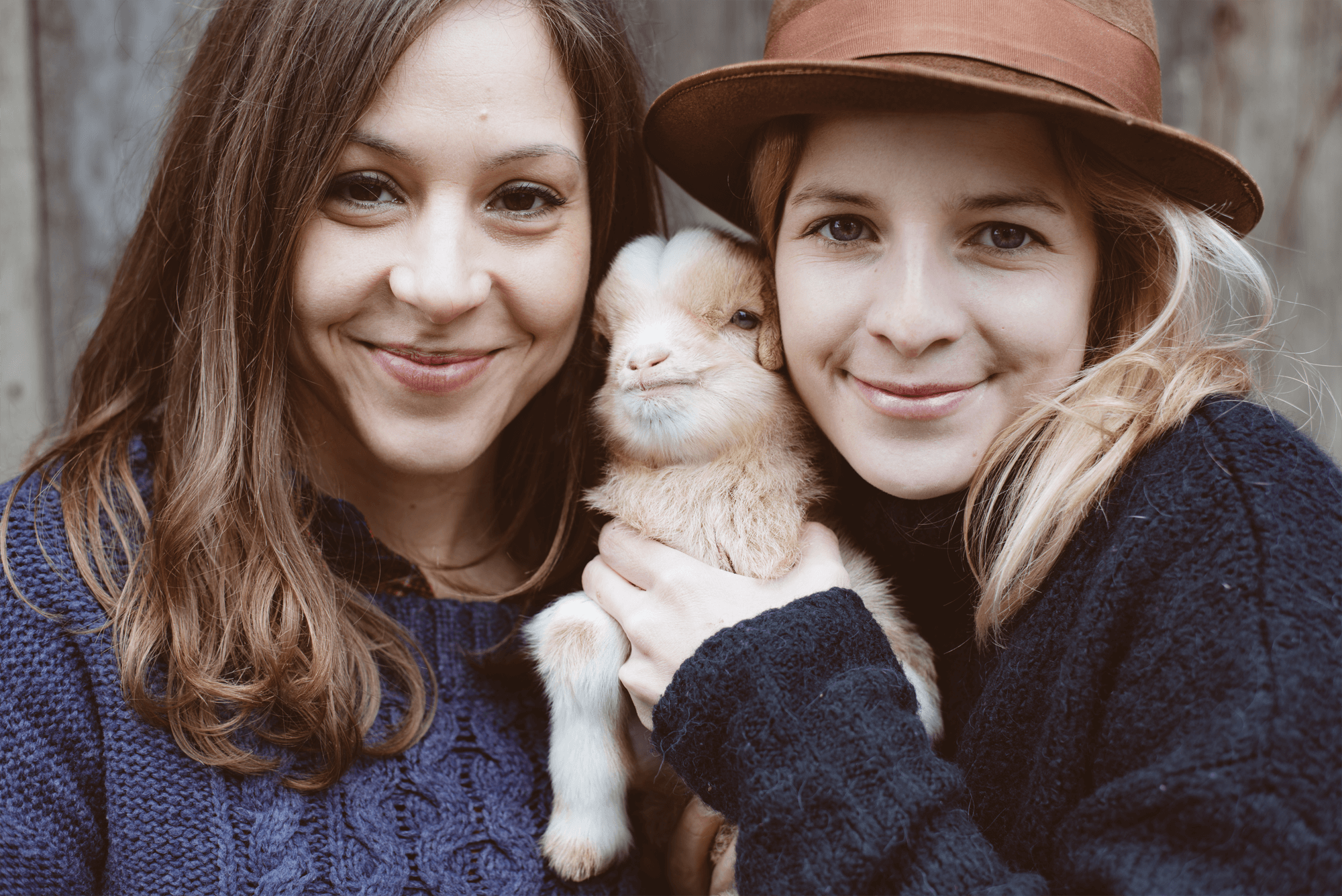 Women With Baby Goat